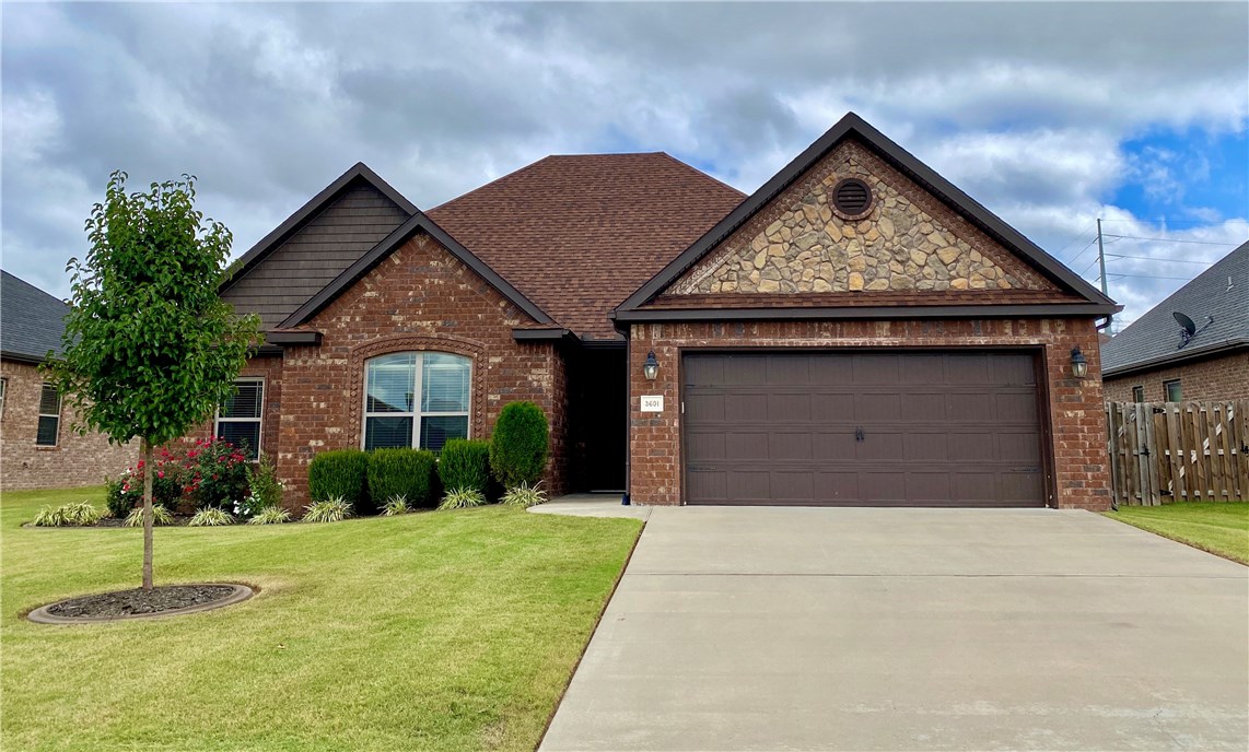 This Willowbrook home really has a WOW factor. Sitting just a few homes down from the community pavilion, this home will grab you with its fabulous curb appeal. What a great floor plan! 4 bedrooms and 3 full baths in a split and open plan! 3 bedrooms and 2 full baths on the main level and one large bedroom with a full bath on the upper level. That 4th bedroom would also make a fabulous bonus room. Wait until you see the enormous living room! The kitchen has all that you need- bar top, built-in oven and microwave, gas cooktop, pantry, and hood. An extra-large eat-in kitchen will fit a large dining table. The spacious master bedroom has an extra nook for a dresser or TV. The Master bath has tons of vanity space, a large jetted tub, and a custom tiled shower. The backyard is fully fenced and completely level. Other extras include insulated garage doors, epoxy garage floors, and central vacuum system. This home is the one you have been waiting for so act fast and schedule your showing today!