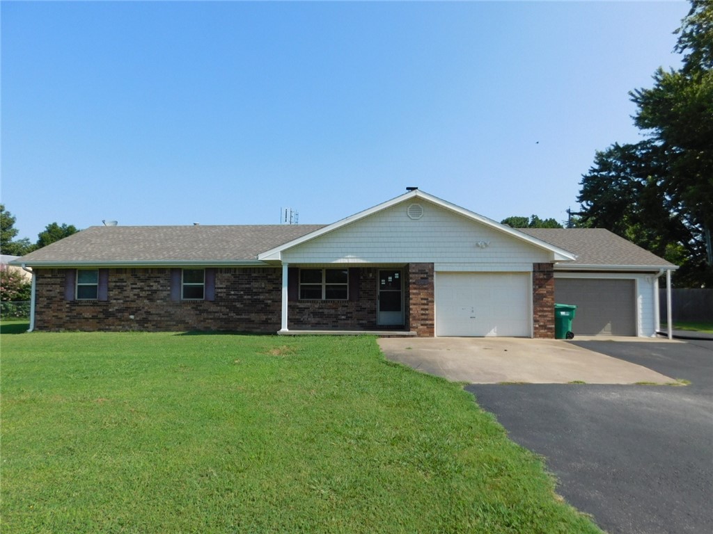 Great location in the center of Farmington! 0.74 acre with a 1,774 sq. ft. house. There is a very nice 20x30 shop with window heat & air. Great workshop, very clean condition. Walk to Lynch School. Shop has separate address and electric, but no water. Very large utility room. Move-in ready.