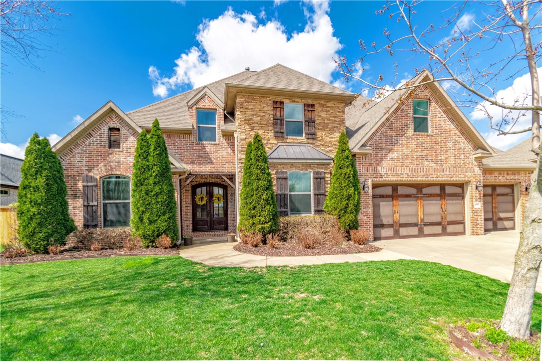 Beautiful well kept home in the sought after Creekside gated community! Located in the heart of Northwest Arkansas, this home is only minutes to Promenade Mall, Pinnacle Country Club, Top Golf, Bass Pro, shopping, dining, and more! Neighborhood features a massive walk in gunite pool and club house. Home features as spacious open layout, 5 bedrooms, 4.5 bath, office, bonus room, granite counter tops throughout, wood beams, stone fireplace, huge outdoor fire pit, large kitchen, 5 burner gas cooktop, double ovens, big pantry, tornado shelter in master closet, covered porch, extensive landscaping, and so much more!