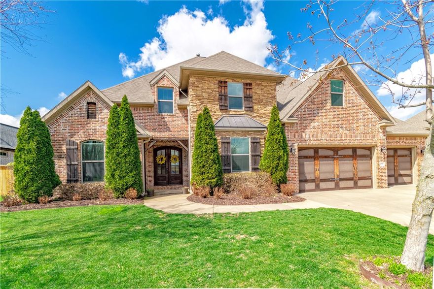Beautiful well kept home in the sought after Creekside gated community!  Located in the heart of Northwest Arkansas, this home is only minutes to Promenade Mall, Pinnacle Country Club, Top Golf, Bass Pro, shopping, dining, and more!   Neighborhood features a massive walk in gunite pool and club house.  Home features as spacious open layout, 5 bedrooms, 4.5 bath, office, bonus room, granite counter tops throughout, wood beams, stone fireplace, huge outdoor fire pit, large kitchen, 5 burner gas cooktop, double ovens, big pantry, tornado shelter in master closet, covered porch, extensive landscaping, and so much more!