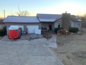 Half acre lot with highway frontage on Hwy 65S just outside the city limits of Harrison. Utilities on the property. Includes an older 3 bedroom, 1 1/2 bath home that needs repaired. Being sold ''as is.'' Good business location with highway frontage.