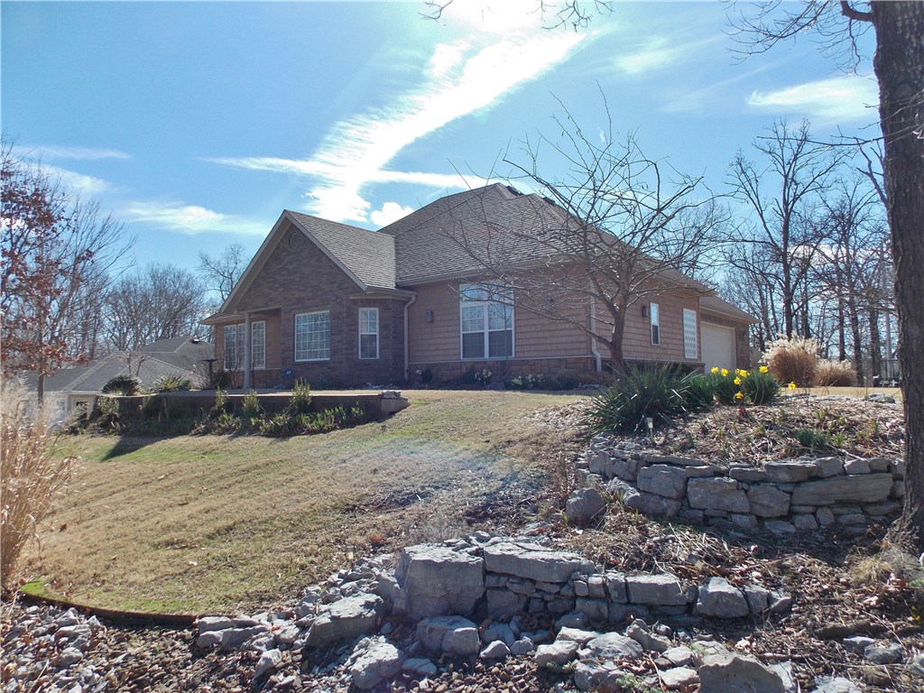 Fabulous Built home by Gene Knight, Custom Design. Open, Split Floor Plan, 2 Sided FP Living Room-Family Room. A Chefs kitchen of your dreams, so much counter & cabinets space, open dinning area. Spacious rooms, walk in closets are a WOW!! Half bath off Laundry room. 3rd Bedroom has built in cabinets, is being used as office with door to covered deck. Fence in yard with storage shed. Garage is a 2.5, you have room for golf cart & workshop. Landscaping is beautiful, wonderful curb appeal. Location great.