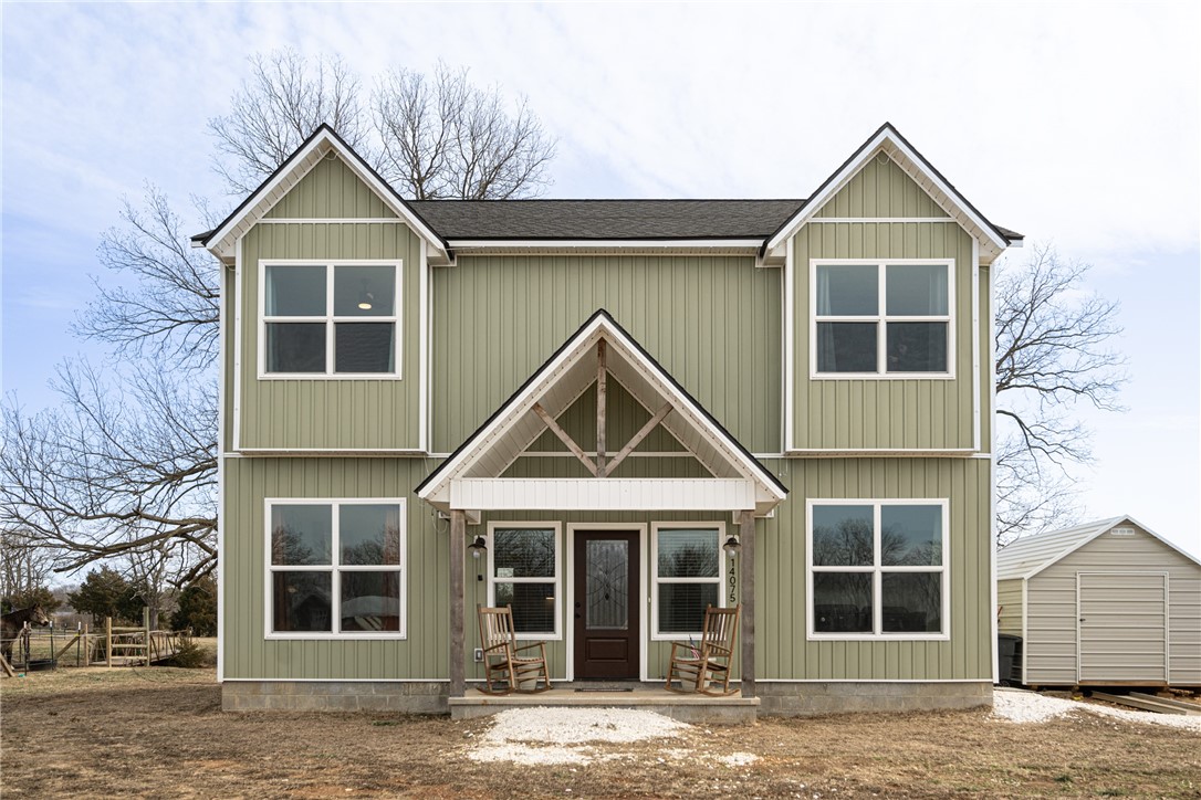 Welcome to this stunning 2023-built home, offering modern comfort & serene country living on 7 leveled acres. This spacious 3-bedroom, 2.5-bathroom home features a versatile office space & a bonus living room, perfect for any lifestyle. The large kitchen island serves as the heart of the home, complemented by ample cabinet space for all your storage needs. Step outside & enjoy the peaceful surroundings with Otter creek running through the property, providing a tranquil backdrop. The property also includes a storage building and a lean-to, offering plenty of room for tools, equipment, or outdoor projects, along with a carport with a 50 amp hookup. Relax on the covered front porch, where you can take in the scenic views & enjoy the privacy of your expansive lot. All of this is just minutes from the amenities & conveniences of Pea Ridge, making this the perfect blend of country living with easy access to town. Don't miss your chance to call this beautiful property home!