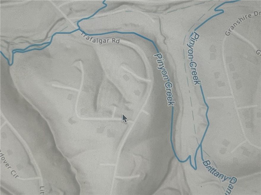 Large Lot Surrounded by Trails and Lakes!  Feet away from Pinyon Creek Trail, What the Chuck, Flo-Ride, Go-Ride, Pinyon Creek AT Flo Ride Trailhead And SBAT to the immediate North.  Summit School, Back 40 Loop AND the lovely Lake Ann to the West in no more than 1 mile.  Rago to Blowing Springs Greenway immediately  South. And Pinyon Creek, Lake Brittany Dam Trails less than 300 feet away, and The Ledges and Back 40 Loop 1/2 mile away to the East.  This lot is buildable and surrounded by all that makes Bella Vista one of the most unique communities in the US.  Bella Vista is the crown jewel of the Mountain Bike Capital of the World and well established as the best in NWA for Resort & Recreation Living. And Bentonville Schools!