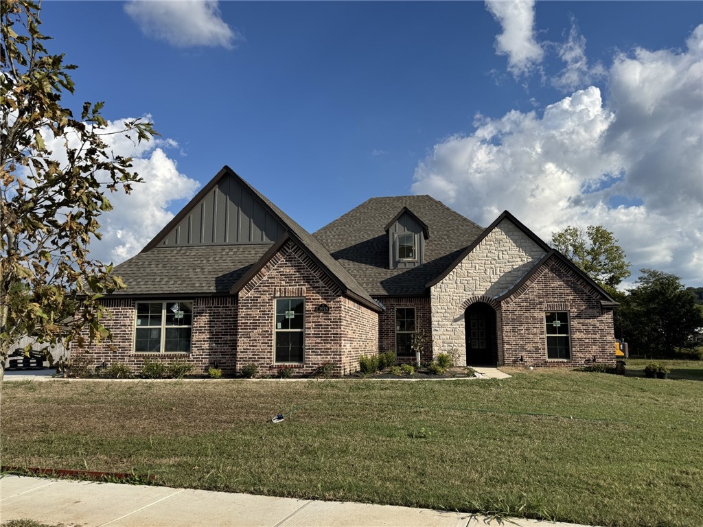 This beautifully designed residence offers a seamless open-concept layout, blending the living, dining, and kitchen areas for effortless everyday living and entertaining. The kitchen is the heart of the home, featuring a hidden walk-in pantry, stylish finishes, and plenty of space to gather.
A charming brick wall accent in the master bedroom and carefully selected tile details add warmth and personality throughout the home. Upstairs, a spacious bonus room provides endless options—whether you envision a media room, playroom, or private home office.
With a three-car garage, there’s ample storage for vehicles, hobbies, and more.
This home combines thoughtful design, character, and functionality—ready to welcome its next owners!
Please note: 
Lot line adjustment is in progress.