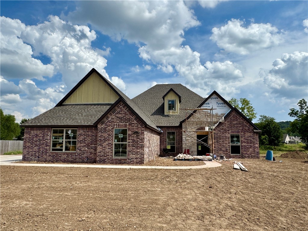This beautifully designed residence offers a seamless open-concept layout, blending the living, dining, and kitchen areas for effortless everyday living and entertaining. The kitchen is the heart of the home, featuring a hidden walk-in pantry, stylish finishes, and plenty of space to gather.
A charming brick wall accent in the master bedroom and carefully selected tile details add warmth and personality throughout the home. Upstairs, a spacious bonus room provides endless options—whether you envision a media room, playroom, or private home office.
With a three-car garage, there’s ample storage for vehicles, hobbies, and more.
This home combines thoughtful design, character, and functionality—ready to welcome its next owners!
Please note:
Lot line adjustment is in progress.