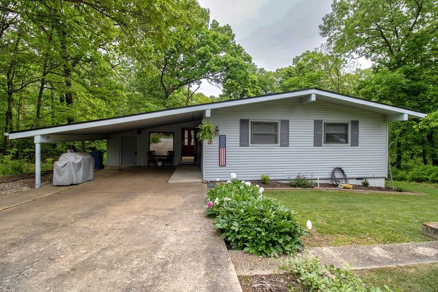 Inviting 2-bed, 2-bath home at 3 Lancaster Drive, Bella Vista, AR! Nestled in a peaceful, wooded setting, this well-maintained property features an open floor plan, spacious bedrooms, and a cozy living area with abundant natural light. Enjoy nature from the back deck, with easy access to trails, golf, and lakes. Perfect for full-time living or a quiet getaway.