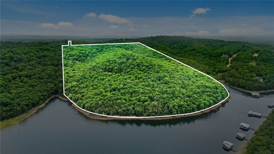 Discover an extraordinary opportunity in the heart of Beaver Lake. 47 acres offering a rare combination of panoramic lake view, and premier lakefront property with exceptional development potential. This unique property provides the ideal setting for a luxury residential development, private estate community, vacation retreat, or investment project. Rolling topography, mature timber, and multiple scenic building sites showcase breathtaking views of Beaver Lake from numerous vantage points. The lakefront acreage offers direct access to the shoreline, creating endless possibilities for upscale lakefront homes. Conveniently located near a marina, recreational attractions, and NW Arkansas amenities, a rare chance to acquire a large scale lake property in one of the region's most sought after destination. Potential uses include: Luxury Home Development, Private Gated Community, Short Term Rental. Rarely does a property of this size, beauty, and versatility become available on Beaver Lake. Endless possibilities await!