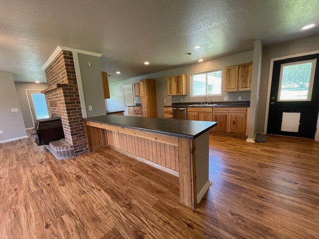 Country living just minutes from town. This 3 bed/2 bath home is situated on 1.81 acres and fenced on all four sides. Ideal for a hobby farm with a blend of cleared flat outdoor space with mature shade trees. The interior offers a bright, inviting layout with generous living spaces. The two car garage has been converted to a bonus room that is not included in the square footage. There is an office that could easily be transformed into an extra bedroom. The open eat-in kitchen has new appliances that flows into a family room with an abundance of natural light, a wood burning stove and a picture window that overlooks a wooded backyard. This well-maintained property is just 15 minutes away from downtown Bentonville and in Bentonville School District. Prime location, lots of potential, this property wonāt last long!