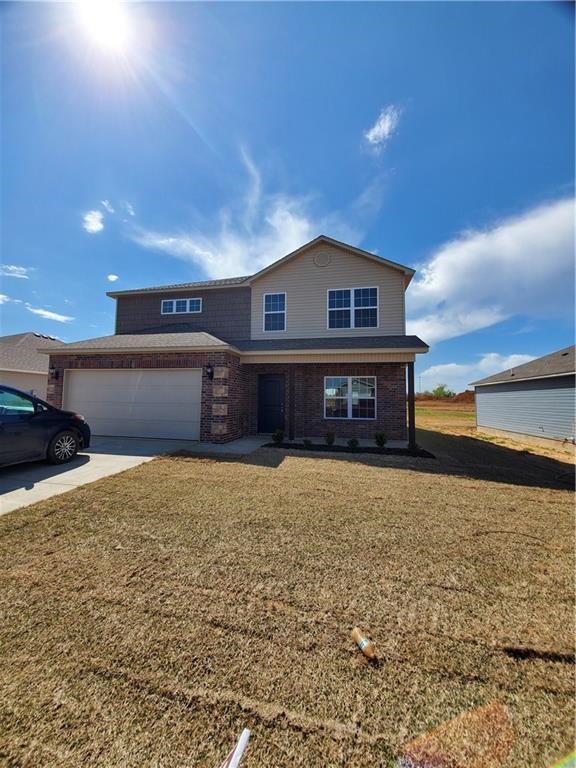 Wonderful new construction home with the master suite downstairs and other bedrooms upstairs. Neighborhood has a walking trail and close to the new Bentonville West High School.