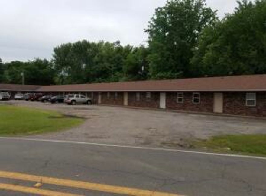 ** 16 unit Investment Property** with great rental history and cash flow!! This low maintenance brick 16 unit complex is located in Clarksville and only a short walk two blocks to  college of the Ozarks.
