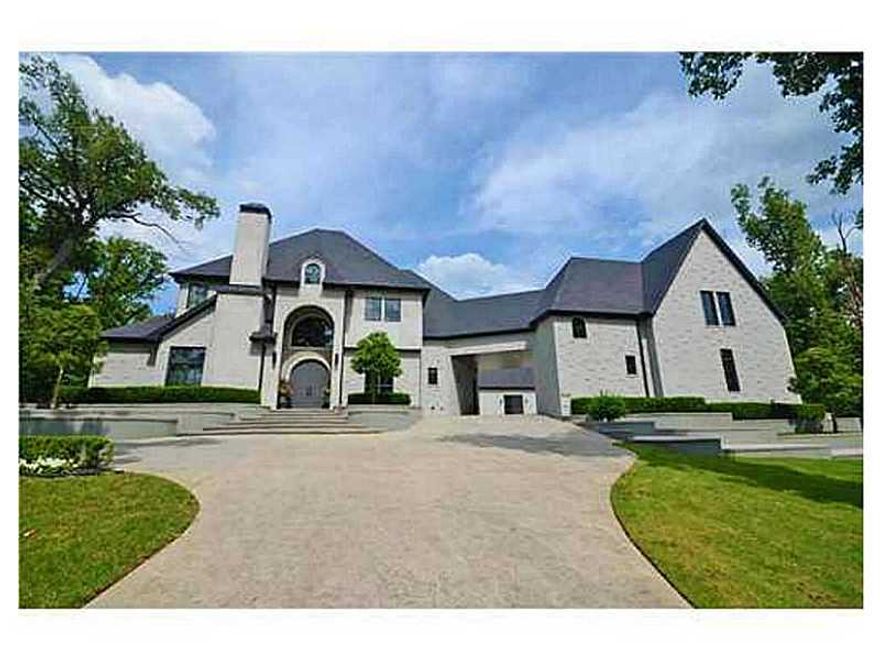 Custom Built Masterpiece Estate on over 2 Acres in the center of NWA. 7,500sf, 5 bedroom/6.5 bath home is located perfectly w/easy access to Fayetteville or Rogers & provides the perfect combination of luxury & matchless quality. Definitely a home of,distinction w/architectural features throughout inside & out! Every bedroom has its own private bath. 5th bed can also be accessed from garage for a wonderful apartment. Home theater, bonus room w/kitchenette, dance/ballet room, outdoor kitchen.