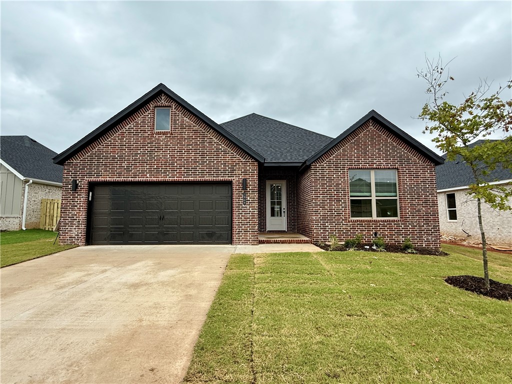 Pea Ridge boasts a variety of activities, all set against the town's scenic beauty. With abundant outdoor recreation, a strong community atmosphere, and affordable living, Pea Ridge stands out as one of Northwest Arkansas' top emerging communities.Step into the Falcon Plan, where LVP flooring spans the living spaces and every detail is thoughtfully designed, from tiled showers to premium 3CM granite countertops throughout. The utility room, with striking decorative tiles, offers direct access to the primary bedroom, making laundry effortless. The primary bedroom serves as a serene retreat, featuring exposed wood beams and large windows that fill the space with natural light. A cozy nook in the living room adds functionality, ideal as a study.The open-concept layout seamlessly connects the kitchen, dining, and living areas, flowing into a covered back patio that offers serene views of your tree-lined lot. For a limited time rates starting at 4.99% OR $7,500 from builder & up to $4K from preferred lender.