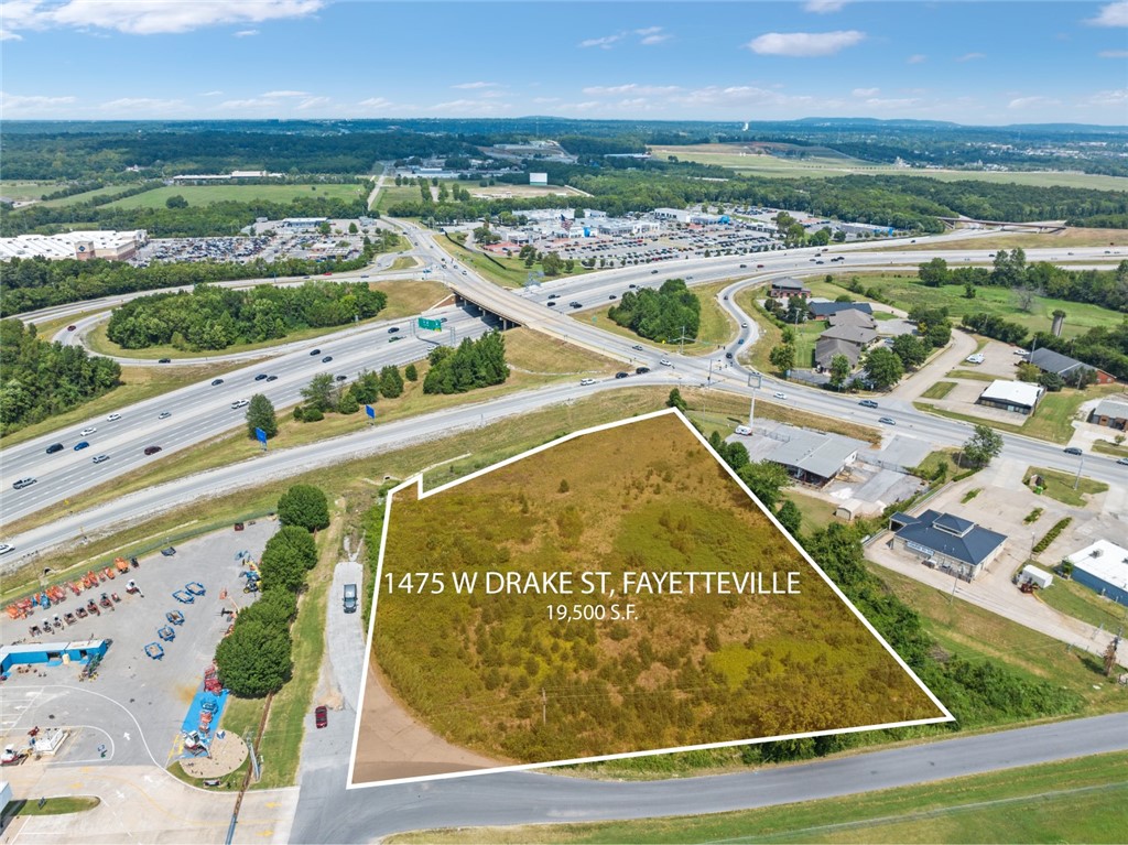 Amazing opportunity to own 2.76 acres of level commercial land with easy access to I49. Offers highway visibility and close proximity to University of Arkansas, Uptown Fayetteville, College Avenue, and easy access to Springdale, Rogers, & Bentonville. Zoned C-2. Survey & full legal attached.