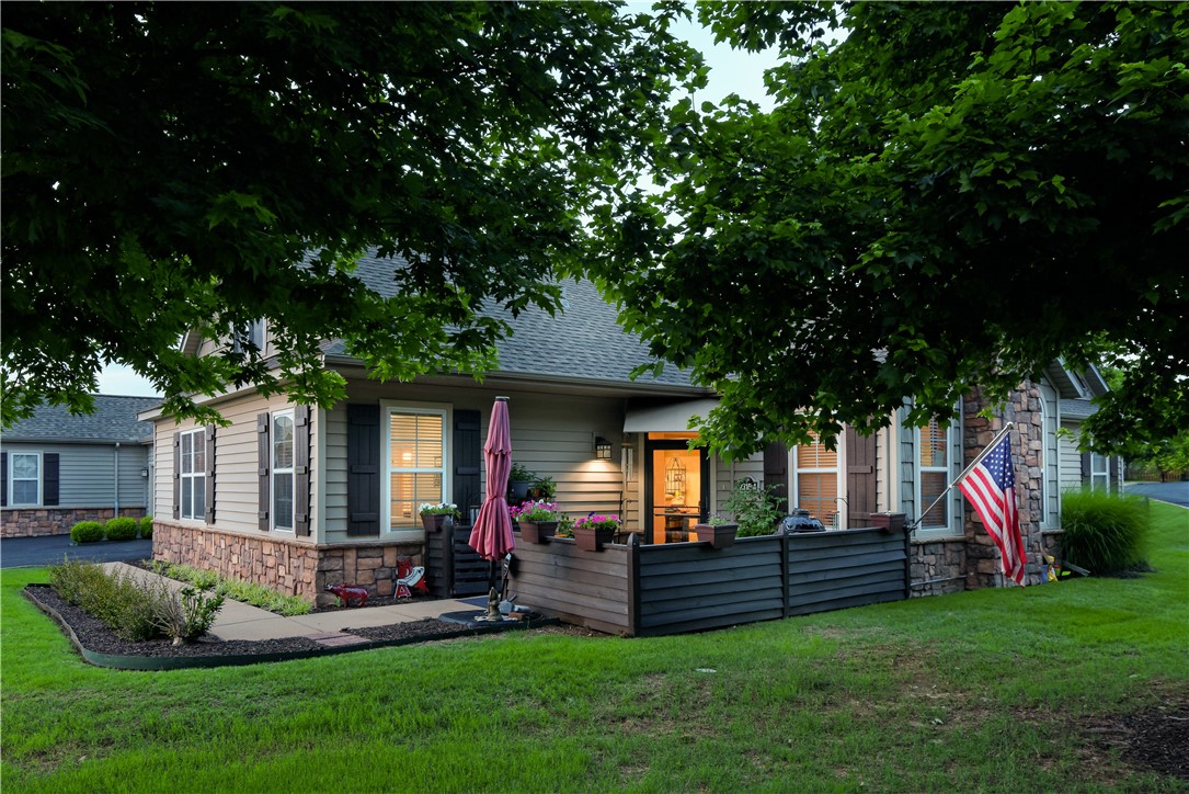 Great turn-key, 3 bed 2.5 bath townhome with 2132 SF of beautifully arranged flex space! Among the many features: large dine-in, granite kitchen w/breakfast bar, island, pantry, dishwasher, built-in microwave & tons of cabinet & counter space! Family room boasts cathedral ceiling, w/fan & vented/switched, gas log fireplace! Main level Master & bath features granite counter, vanity & large walk-in shower & closet w/built-ins! Other main level features: 2nd bedroom, half bath & large utility room w/granite counter, wet sink & storage room! Upstairs: huge 21'3 x 16' media/bonus/rec/3rd bedroom & 19'10 x 8'4 full bath, closet & storage room! Outside: gated patio includes seating & makes perfect cook out & meeting space. Other pluses: LED lighting, 2 car garage w/attic storage, keyless entry & security systems. POA dues cover: grounds & ext. building maintenance, hazard & liability insurance, pool & beautifully furnished clubhouse w/meeting & fitness rooms! Needs nothing but lucky new owners! Check out the Virtual Tour!