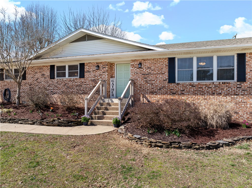 You will want to see this stunning brick home. Recently updated. Move in ready. Large privacy fenced back yard. Within walking distance to Skyline Elementary. There was a water softner and whole home filter installed in 2024 so you get the highest quality water throughout the house. You will enjoy the screened in back porch over a cup of coffee in the morning. This house has that warm inviting feel you are looking for. A great place to have your friends over. Make this house your home today!