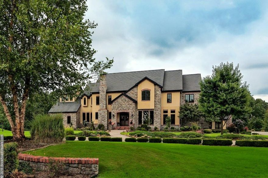 Private resort style backyard with multi-level decks, swimming pool, 2 outdoor kitchens, fire pit, fireplace, and guest house.  Beautiful curb appeal, state of the art kitchen, and open floorplan great for entertainment.  Custom designed wine cellar.  Organizers dream home with lots of built ins and custom closet features.  Quality finishes and craftsmanship thoughout.  Just minutes form new Bentonville West HS and WM HO.