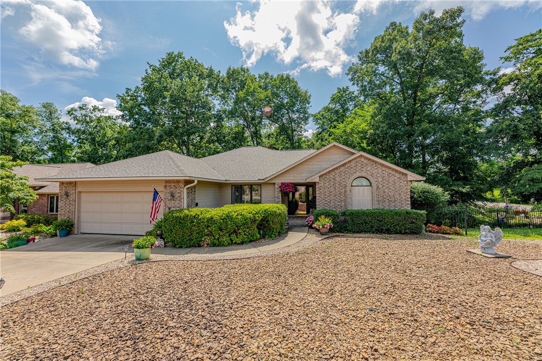 Charming 3 bed, 2 bath home near the 16th hole at Highlands Golf Course! The renovated primary bath features a spacious walk-in tiled shower. Kitchen upgrades include new granite countertops, stove, and dishwasher. Enjoy new flooring in the living and dining rooms, plus a new roof in 2022. Bonus sunroom offers additional living space, and the lower level includes a heated/cooled workshop. Conveniently located near the Highlands Pro Shop & Restaurant, with easy access to Bentonville and Rogers via the bypass. This is located on a very desirable quiet cut-de-sac. You will love the convenience and the upgrades! Welcome Home!