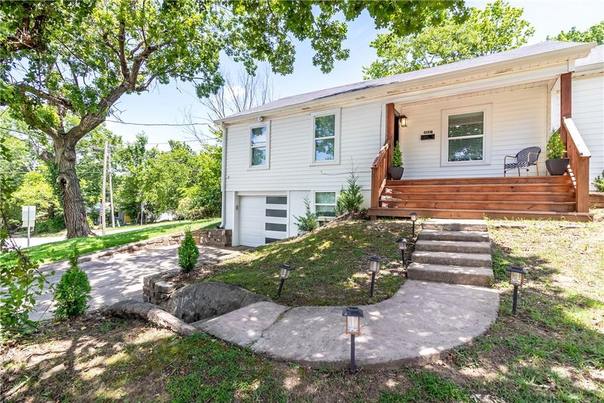 Located on the edge of the Fayetteville Historic District, this 3 bed, 2 bath home is within walking distance of the Fayetteville Square, Dickson Street, and the University of Arkansas. This newly remodeled home features all-new appliances, windows, kitchen, and bathrooms, along with hardwood floors and granite counters throughout. Large private deck is great for entertaining. Stylish, modern, and move-in ready in June in the heart of town.