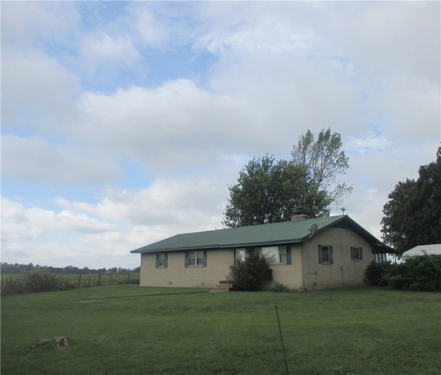 Price Reduction!! This cattle farm with lush pasture, 3 ponds with about 115 acres of "tillable ground" features country setting with brick home, wood burning fireplace & mature shade! Hay barn, outbuildings & has rural water (with public natural gas available at street), propane tank, three ponds & apprx 15 acres of timber! Lots of hay ground, fescue/bermuda grass combo! 1970 , three bedroom, 2 bath with some updates, 2018 HVAC. double pane vinyl windows, has 2 wells & cross fenced. "hard to find acreage", priced right!