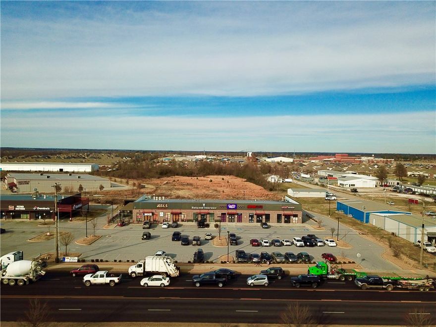 A 12,883 SF retail center on 4.1± acres located next to the 412/112 intersection. Highly visible with frontage along Hwy 412. Diverse tenant mix with restaurants, professional services, and national hair salon chain. NNN leases running through 2024 with close proximity to Har Ber high school, Towne Center Apartments, and Arvest Ballpark.