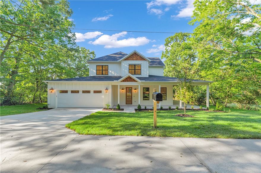 Welcome to 1559 W Cassi Aly—a rare opportunity to own new construction in one of Fayetteville’s most established & desirable neighborhoods. This property presents not just a beautiful home, but a strategic investment opportunity in a high-demand location. Situated just minutes from the Razorback Football Stadium, Bud Walton and Baum-Walker, this home offers unparalleled access to game-day excitement, the University of Arkansas, and Fayetteville’s thriving entertainment & dining scene. This thoughtfully designed home features 4 spacious bedrooms, a private office ideal for remote work, a large bonus room, sunroom for year-round natural light and relaxation, and an expansive wraparound covered porch with a fireplace, perfect for entertaining or enjoying quiet evenings outdoors. Whether you're a homeowner seeking luxury & location or an investor looking for long-term value, this home checks all the boxes.