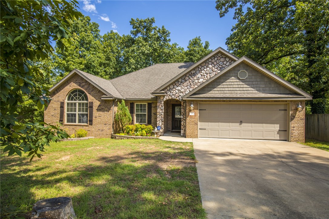 Love where you live! Relaxation and lifestyle are waiting for you in this beautiful home. Real hardwood floors and amazing floor plan featuring soaring ceilings in living room. Private backyard with expansive deck perfect for relaxing or entertaining while enjoying the wooded view. Spacious kitchen with custom cabinets and pantry boasting granite countertops. Just 1/2 mile to access the Back 40 trail perfect for the cyclist! Amazing and desirable location this home is just waiting for you!