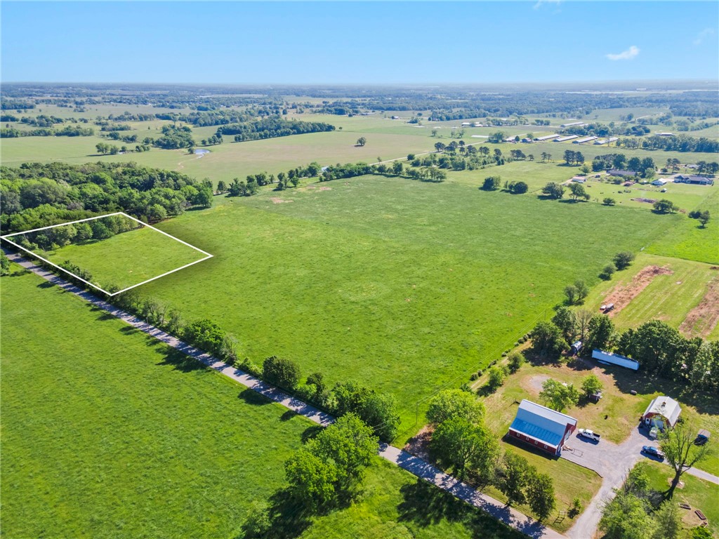Just 10 minutes from the Northwest Arkansas airport, discover an exclusive opportunity to claim 3.77 acres of pristine, flat land where elegance and tranquility meet. This rare gem offers uninterrupted views of both sunrise and sunset, creating a breathtaking backdrop for a lifestyle of refined comfort and serenity. The land stretches wide and open beneath a vast sky, inviting you to dream without limits.
Imagine a custom estate tucked into the peaceful landscapeāgrand entrances, sleek architecture, manicured grounds, and sophisticated outdoor spaces designed for hosting under the stars. Whether youāre envisioning a modern sanctuary or a timeless retreat, this land provides the foundation to build your legacy. Privacy, beauty, and convenience converge in one exceptional locationāclose to everything, yet far enough to feel like your own private escape. Your future deserves a setting this extraordinary. Let luxury begin here.
