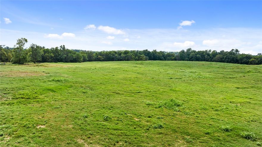 30.02 Acres M/L in Gentry – Prime Development Opportunity! Just 10 miles from XNA, this 30.02-acre property offers endless potential with utilities already available—including gas, water, and electric. Featuring beautiful house sites with sweeping views, this land is perfect for a private estate, small development, or investment property. A 30x60 barn with electric and water is already on-site, adding immediate value and functionality. With its combination of location, infrastructure, and scenic setting, this tract is a rare find in the Gentry area. Don’t miss your chance to own land in one of Northwest Arkansas’ fastest-growing regions!