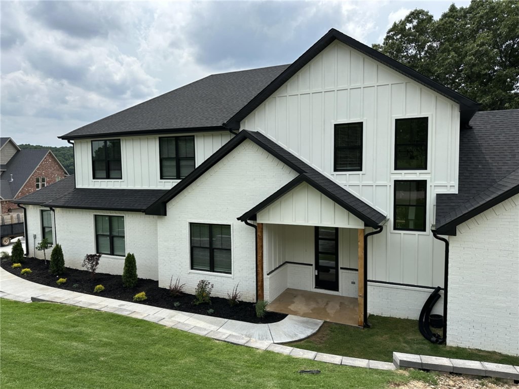 Welcome home to the beloved Eau Claire subdivision! Nestled on 1.25 acres with gorgeous valley views, this spacious 4-bedroom, 3.5-bath retreat offers 3,307 SF of thoughtfully designed living space with an upstairs bonus room—perfect for movie nights, play space, or a game room—as well as a dedicated office featuring a custom accent wall. The home boasts storage everywhere, so there’s a place for everything (and everyone). The oversized 900 SF garage includes custom epoxy flooring, ideal for projects, parking, or extra storage. At the heart of the home is a stunning chef’s kitchen with luxury finishes and a walk-in butler’s pantry—perfect for entertaining or keeping daily life organized. With 3 heating and 3 AC units, you’ll enjoy comfort in every season. Outside, take in the views from the expansive deck, offering a peaceful setting to unwind or entertain. Zoned for Bentonville Schools and just a short drive to trails, parks, and downtown, this home checks all the boxes for comfort, style, and location.