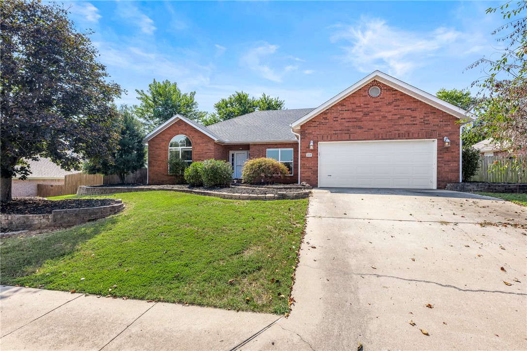 Welcome to this inviting 4-bedroom, 2-bathroom home offering 2,071 sqft of comfortable living space. The thoughtful split floor plan provides both privacy & functionality, w/ a seamless flow throughout. From the front door, step into a spacious living room featuring a cozy gas fireplace. The bright and airy kitchen offers plenty of room to cook & gather, featuring a breakfast nook with a large window overlooking the backyard. A formal dining room adds extra space for entertaining & hosting special occasions. The primary suite is a relaxing retreat, featuring a walk-in shower, jetted tub, & a large walk-in closet. On the opposite side of the home, youāll find three additional bedrooms & full bath. Located just minutes from Johnson Square, Northwest Arkansas Mall, eateries, entertainment and offering easy access to I-49, this home combines convenience with comfort. Sept 2022 Pella Windows, & Roof. 2018 water heater and garage door motor replaced.