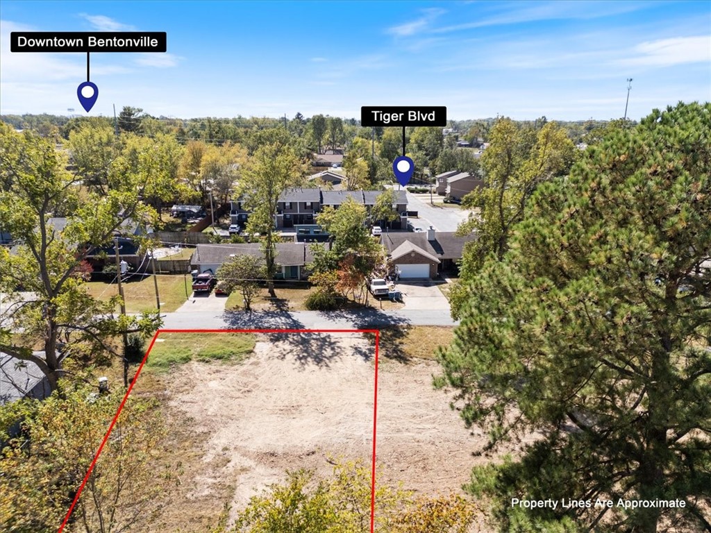 RARE FIND AS CLOSE AS IT GETS TO DOWNTOWN BENTONVILLE!! Cleared lot ready for you to build your beautiful home you have always dreamed of! Bike or walk to the Downtown Bentonville restaurants, farmer's markets and First Fridays. Hop on a mountain bike trail or paved walking trail to beautiful Crystal Bridges! Enjoy the amenities Bentonville has to offer with this currently available buildable lot just for you. It may go fast! This is an opportunity you can't miss!