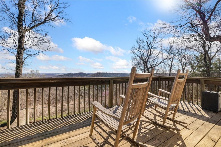 Play where you live!  Set on 52 m/l acres, this home & property offer the kind of freedom most people dream about. With 3 springs and a year-round creek, the land is alive with natural beauty and endless outdoor adventure. 3 miles of established trails wind through the property—perfect for ATVs, side-by-sides and mountain bikes. Wildlife is plenty, making this an ideal place to hunt deer, turkey, bear, and boar right on your own land.  The home, built in 2006,  offers 4 or 5 bedrooms and 3 full bathrooms. Enjoy incredible sunrise views of the mountains and vistas that stretch for miles.  Inside, you’ll find new carpet installed (2024). With 2,568 sqft on 2 levels, the walkout basement is perfect for guests or entertaining, featuring 1–2 bedrooms, the 3rd full bath, a second living area, wet bar, and additional storage room. Whether you're looking for a hunting retreat, outdoor playground, or peaceful place to call home, this property offers the rare opportunity to live, explore, and enjoy nature every single day!