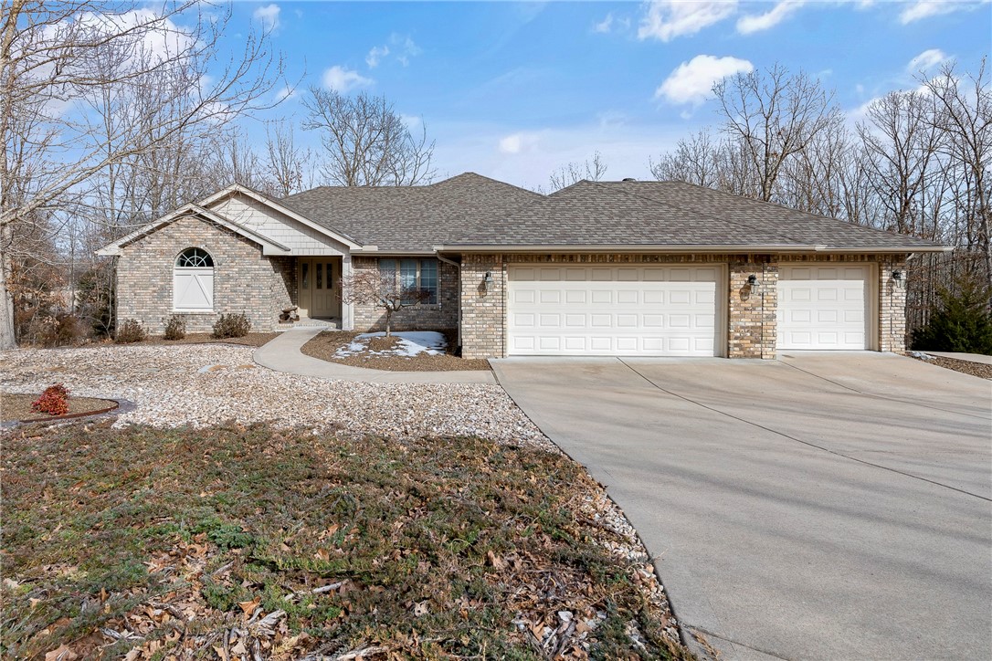 A quality build O.A.K Home Builders house, offering an open concept with built ins, lots of windows & light includes a beautiful sunroom, living room fireplace, a split bedroom plan with oak hardwood floors, large master suite w/walk-in closet. New Roof in November, Geothermal heat system updated furnace, AC & Hot water tank in 2017. Large 3 car garage, Lower-level unfinished basement ideal for a workshop 25' x 22' w/tall ceiling and golf cart path to the shop entry. Situated in a lovely neighborhood, close to shopping & main highways. Freshly painted & polished ready for your approval.