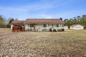 Fixer Upper on 3 Acres in Pottsville School DistrictDiscover the perfect blend of comfort and functionality with this 1,560 sq ft home built in 2009, nestled on 3 fully fenced acres in the sought-after Pottsville School District.This residence needs some repairs but has a spacious living area with fireplace, a modern kitchen, and ample natural light. The property boasts a large shop, ideal for hobbies or storage. The expansive acreage is perfect for outdoor activities, gardening, or keeping animals, all within a securely fenced perimeter.Enjoy the tranquility of rural living while being just minutes from local schools, amenities, and major roadways. Whether you're seeking a peaceful retreat or a family home with room to grow, fix it up and make it your own!