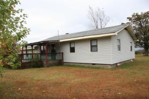 Great view from this 3-5 bedroom 2 bath home. Pole barn, garage/shop, great garden spot, blackberries, peach trees, strawberry, 3 apple & 2 pear trees.