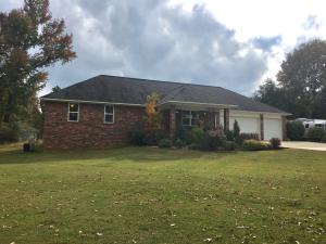 This storybook home is spacious throughout and offers exceptional workmanship, over-sized kitchen cabinetry, breakfast bar and stainless steel appliances, vaulted ceilings and the large laundry room features a charming farmhouse sink. The peaceful master suite offers double sinks, a walk-in closet, and a walk-in shower. The bonus versatile sun room, built-in entertainment center, and beautiful hickory flooring are just a few of the features that this well-loved home has to offer. Placed in a desirable neighborhood that is walking distance from Lake Ludwig, this home features an adorable kids clubhouse, 3 car garage, is beautifully landscaped with a lush fenced lawn, and borders a rock fence with charming steam. Neighboring lots are also for sale! Give us a call today to schedule your tour!