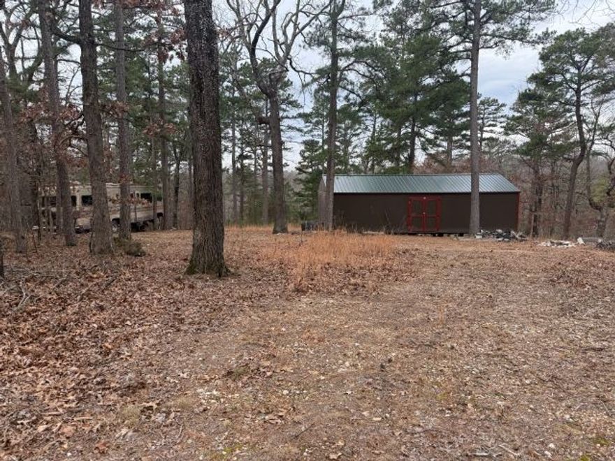 20± acres of unrestricted land featuring mature hardwood timber, abundant wildlife, and a 16x40 unfinished cabin ready for your vision. Electric is already on site, saving time and expense. Enjoy county road frontage for easy access and privacy, all while being just minutes from the lake. Ideal for a weekend retreat, hunting property, future homesite, or investment opportunity. Endless potential with no restrictions—bring your RV, build, or enjoy as-is!