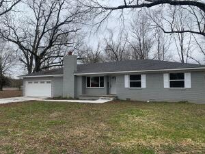 Completely remodeled inside and out!! This like NEW move in ready 4 bedroom 3 bath house sits on 2 city lots. New granite countertops, hardwood flooring, roof, fireplace insert, HVAC unit, the list goes on and on! The 4th bedroom is its own private suite with full bathroom and outdoor access!! The corner lot even has HUGE pecan trees which provides shade on those hot summer days. Don't miss this one!