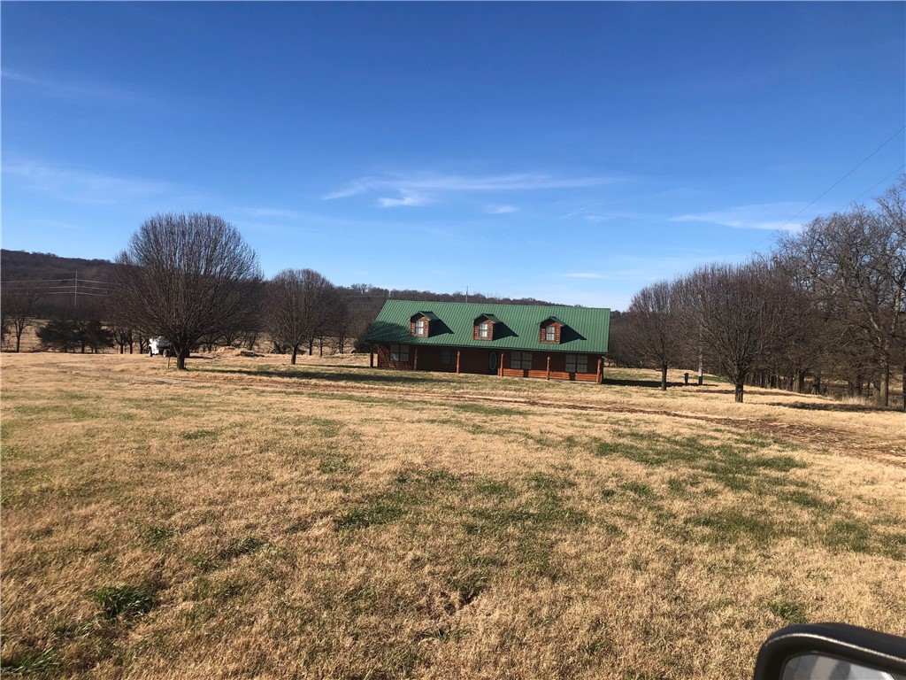 Great log cedar type country house with shop & one acre. Agent owned