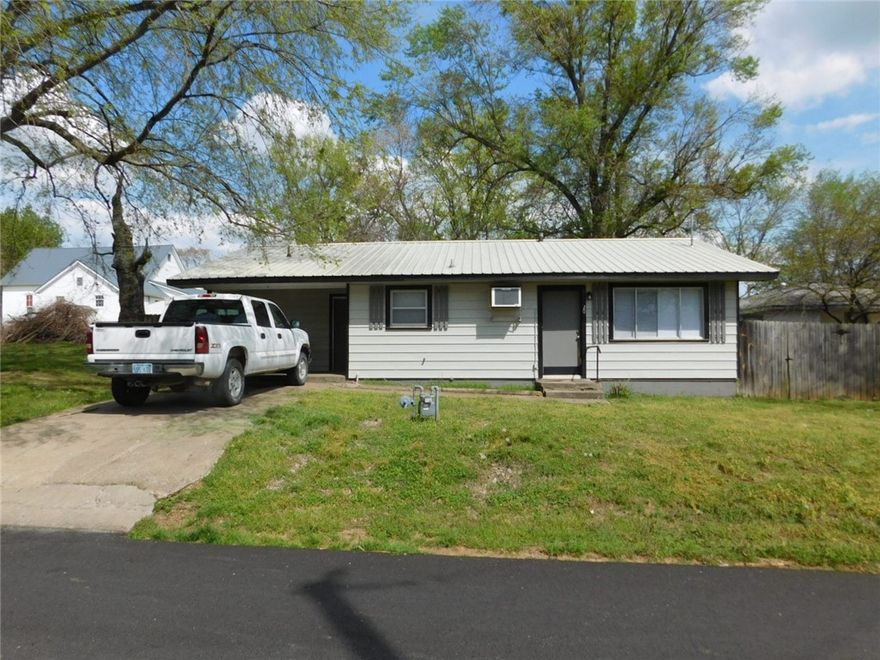 200 FT Hwy 62 frontage in the middle of town, zoned C-2! 3 houses are located on the property. Currently rented month to month. Fantastic location for commercial project. Also 141 & 149 White Street property located directly behind the 3 houses. This gives city streets on 3 sides. Houses sold "AS IS", currently rented at $2,490/mo with room to go up. Agent owned.