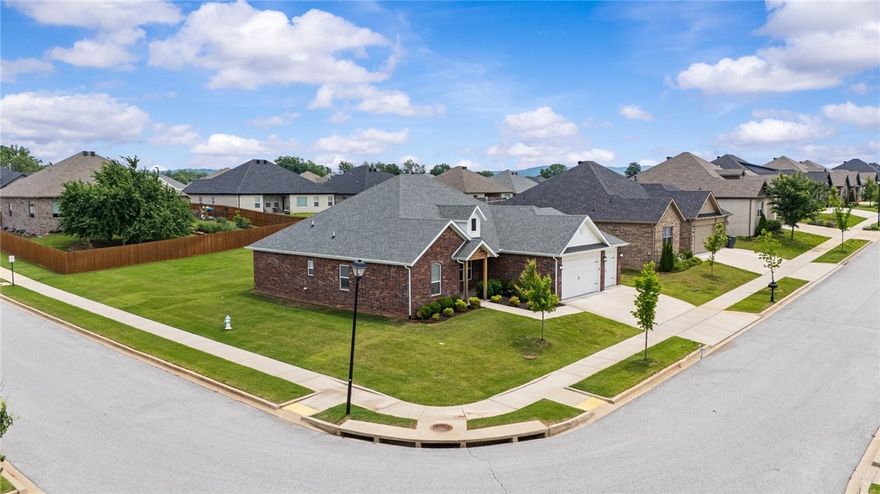 Highly sought after Creekview Addition with pride of ownership throughout.  Homes here don’t last long. This full brick 4 BR/2.5 BA has a well designed, open concept floor plan with multiple layout options.
Chef’s kitchen ready to entertain with granite countertops, stainless steel appliances, walk-in pantry and fantastic island bar.
Peace & quite is sure to impress with covered back patio quietly situated on a corner .3 Acre oversized lot which provides added elbow room. Full front and back irrigation system, Simplisafe Whole Home Security. Plus gas log fireplace in the living room for those cool NWA nights.  
3 Car Garage for maximum space to handle all your toys and extras.  This one owner home has been very well maintained. 
This home is move in ready.