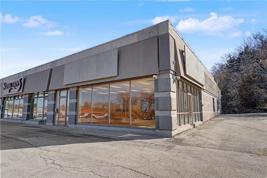 High-visibility retail/office space available for lease on N College Ave, Fayetteville’s primary commercial corridor! This space is currently configured with four private offices and a retail showroom, providing a functional layout for professional office, medical, service, or boutique retail users. This property offers exceptional frontage and strong brand visibility in a well-established trade area.

Floor plan can be reconfigured to accommodate a tenant’s specific operational needs.
Prominent two-sided building signage.
Ample on-site parking.
Location sees approximately 29,500 vehicles per day.
Immediate availability.