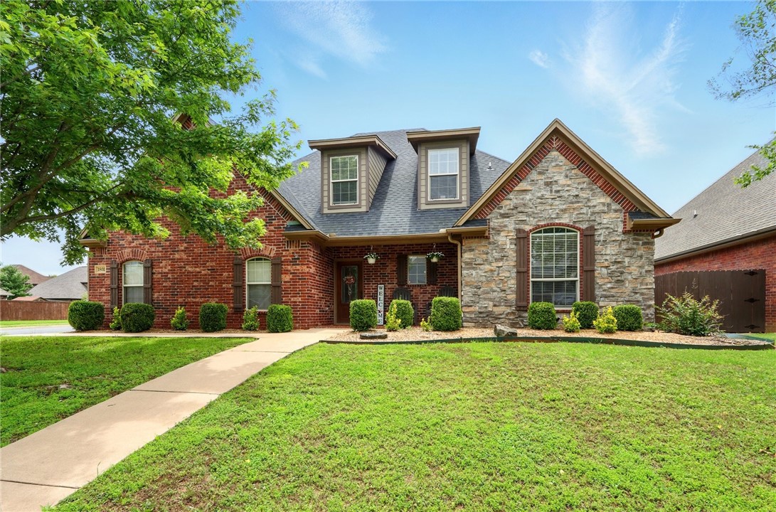 Welcome to this exceptional corner-lot home in the highly desirable Oxford Ridge neighborhood—where thoughtful design meets everyday comfort. Perfectly positioned within walking distance to the Bentonville Community Center, Schools & Oxford Ridge POA Amenities, this home offers the ultimate blend of convenience, community, and lifestyle.Step inside to discover rich wood flooring, bathing in natural light and adding warmth throughout the main living areas. The kitchen is newly updated with new appliances, making it a joy to cook, entertain, or simply enjoy your morning coffee.With an oversized primary suite and three additional bedrooms on the main level, the layout is designed for both comfort and functionality. A new roof (2020) and HVAC system (2022) provide long-term value and peace of mind. Upstairs, a spacious bonus room with its own full bathroom offers endless flexibility—ideal as a home office, guest suite, gym, or playroom.