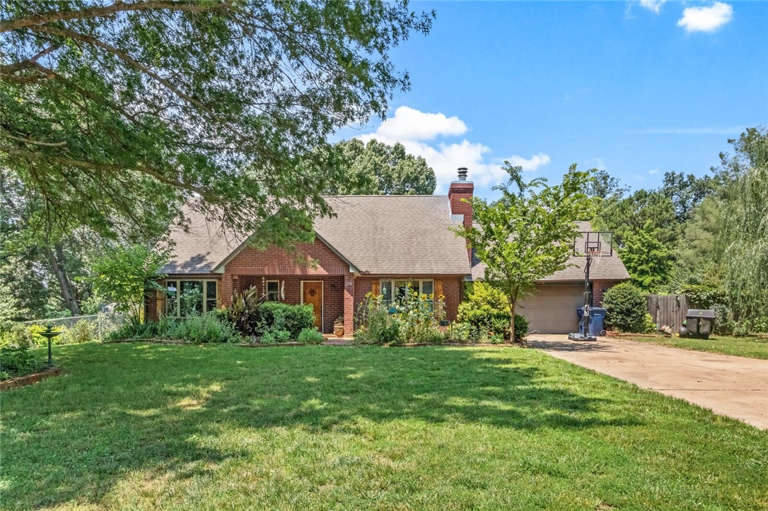*** SELLER WILL PROVIDE $10k allowance for Buyer to use as desired w/ acceptable offer ***If you are looking for a wonderful home in Siloam Springs with just over an acre to enjoy, 3 BR/2 BA (master on the main floor), wood burning insert w/ blowers to heat house, large area in the kitchen for gatherings, extra storage and oversized 2 car garage, commercial grade gas stove, double ovens, inground pool, fruit trees (peach, pear, plum), zip line in the back yard for kiddos, this is the one for you! Updates: Dishwasher (23), Downstairs furnace (20), Pool pump (22), Tile Flooring (19), Kitchen cabinets (20), Front door (18), Windows (22), Shed (16), Fencing (15), Upstairs BR Flooring (15)... Options to convey...(negotiations) patio furniture, Poulin Mower, Trampoline, Zip Line, Basketball Goal. MORE INFO: Fruit Trees, Grapevines, Pool 18x36, Raised Beds in Fenced Yard! 2 Gas Furnaces (up;/down), Laundry is optional gas or electric. gas water heater, gas stove (connection or not - electric oven)