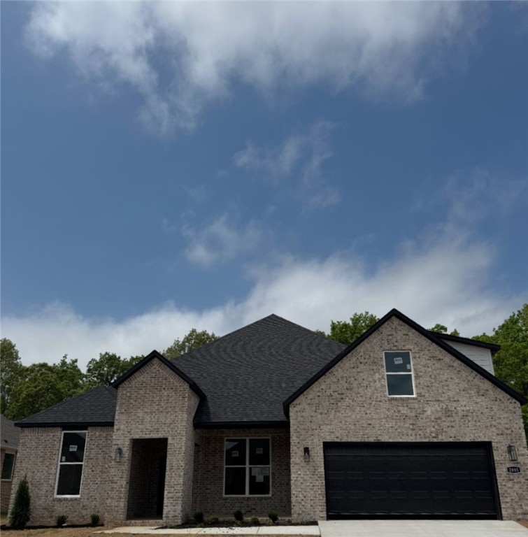 The charming Cooper Bonus plan in Hughmount, located in Fayetteville, Arkansas! The Cooper Bonus plan has 2600 square feet with 4 bedrooms, 3 baths. Use the 4th BR as a Study! This plan also includes a game room on the second floor! Game room area has a full bath and a Walk-in closet so this can be used as an extra bedroom! These brand-new homes boast 4-sided brick and LVP flooring. Upon entering, you will find a spacious living area featuring a gas fireplace with a poplar mantle. The kitchen will have 42-inch cabinets, lovely appliances and quartz countertops and tile backsplash. The Primary bedroom has a fabulous en suite, dual sinks, with a walk-in shower with tiled walls and a soaking tub! These homes feature LED lighting throughout, and a high efficiency AC with programmable Wi-Fi thermostat. Come find your dream home today! Taxes and Parcel TBD. Garage Door Opener!