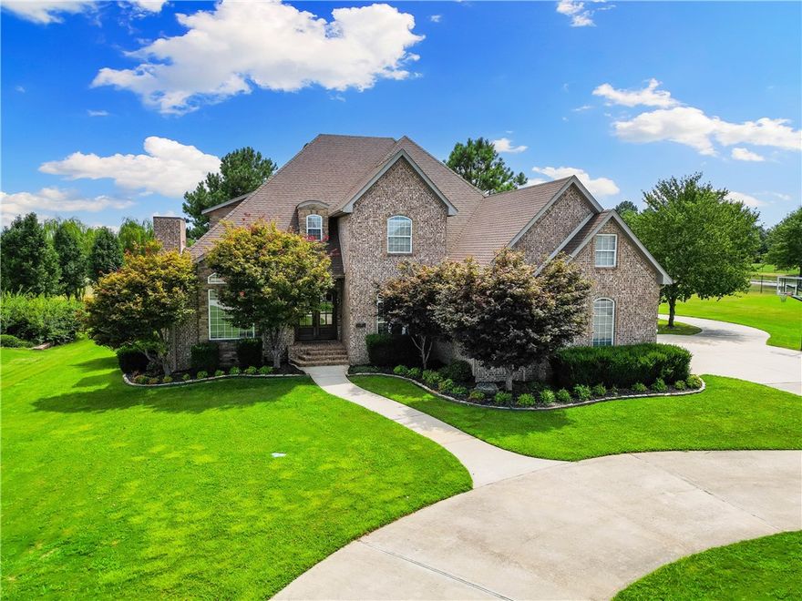 Welcome to your new serene abode, an oasis of privacy and exclusivity, nestled on over 2 acres- all within 9 minutes of downtown Bentonville. Located in sought after Stonebriar neighborhood with large manicured lawns, ponds and a great community feel. Enjoy the spaciousness of the main house with 5 beds, large dining room, sitting room, office and 4 outside decks/porches to enjoy the outdoors. The 755 SF pool house (SF not included in total) with a loft, kitchen with oven, fridge and wine fridge, full bath and an oversized 2 car garage. Luxuriate in the gunite, heated pool or entertain in the custom grill area, there is plenty of room for any outdoor activity with the massive back yard. The home has had several updates including new roof in 2020, two large capacity hot water heaters 2018, 2 new HVAC units 2022, new pool heater 2023, and an invisible fence added in 2023.