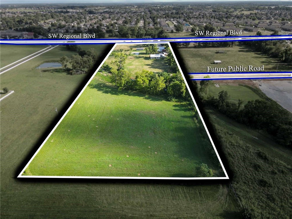 Prime Development Opportunity awaits at 2220 SW Regional Blvd! Already boasting 300 feet of Highway frontage, a recent large scale improvement to the adjacent property to the West has the possibility to bring another source of sewer and water to a property that already had a 12” sewer line running diagonally across it! (See the attached pictures for reference.) The front of the property is currently zoned R-O (Residential-Office), while the back 4-acre parcel is zoned A-1 (Agricultural). The Board of Planning and Zoning (BPC) suggests that the entire acreage could potentially be rezoned as R-O or even R-3, unlocking an opportunity for multi-family housing development. Additionally, there’s a possibility 34th Street expanding West through the property. With a daily traffic count exceeding 30,000, this property offers immense potential.