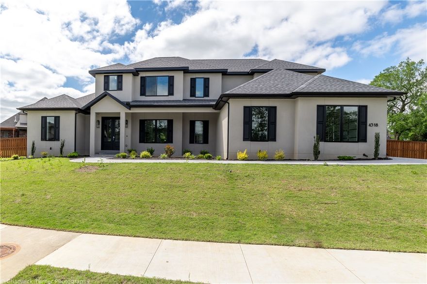 Stunning home in gated community features an amazing layout. Large master bedroom has huge closet and one secondary bedroom w/walk  access to full bathroom on the main level. Open kitchen and living room has plenty of natural light. Kitchen has huge island, double ovens, custom cabinets and walk in pantry. Bonus room with wet bar and access to the covered patio on the MAIN level. Second floor has three private bedrooms with walk in closets. Enjoy the covered patio and tons of space to relax.