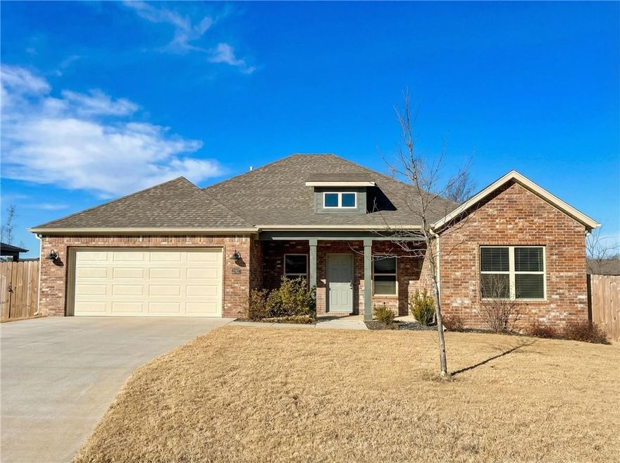 Welcome to Deere Creek in Springdale/Elm Springs! This stunning Heritage Plan offers 4 spacious bedrooms, 3 full baths, and 2,124 sq ft of thoughtfully designed living space. The open-concept layout features tall ceilings, granite countertops, white custom cabinetry, gas log fireplace, and a large pantry—perfect for everyday living and entertaining. Enjoy the rare benefit of two en-suite bedrooms, including a luxurious primary suite with whirlpool tub, separate shower, and oversized closet. Full fence, blinds, and a 2-car garage included. Just steps from the neighborhood walking trail—this home delivers style, comfort, and convenience in one exceptional package. Schedule your private tour today!